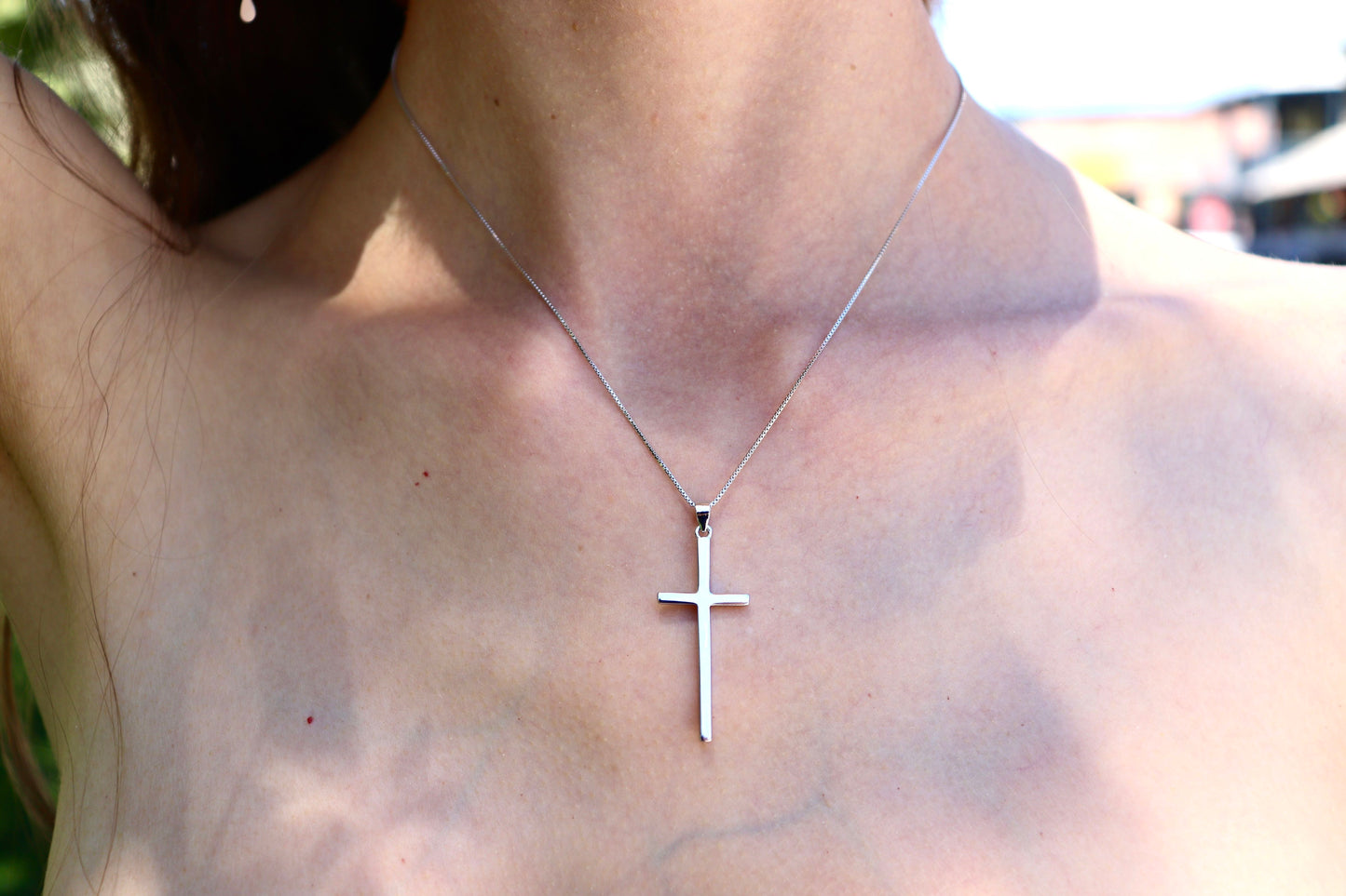 Women's high polish cross pendant